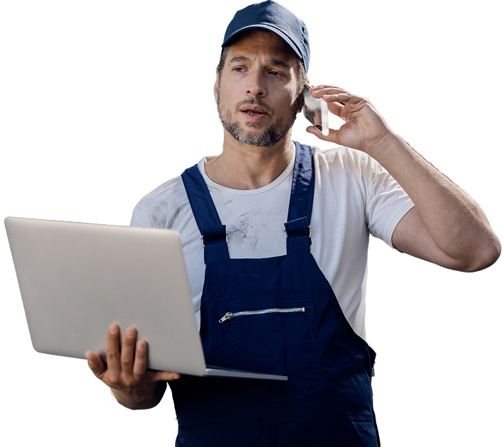 auto-repairman-talking-phone-while-using-laptop-workshop 1 https://cosnetglobal.com/wp-content/uploads/2025/06/auto-repairman-talking-phone-while-using-laptop-workshop-1.png